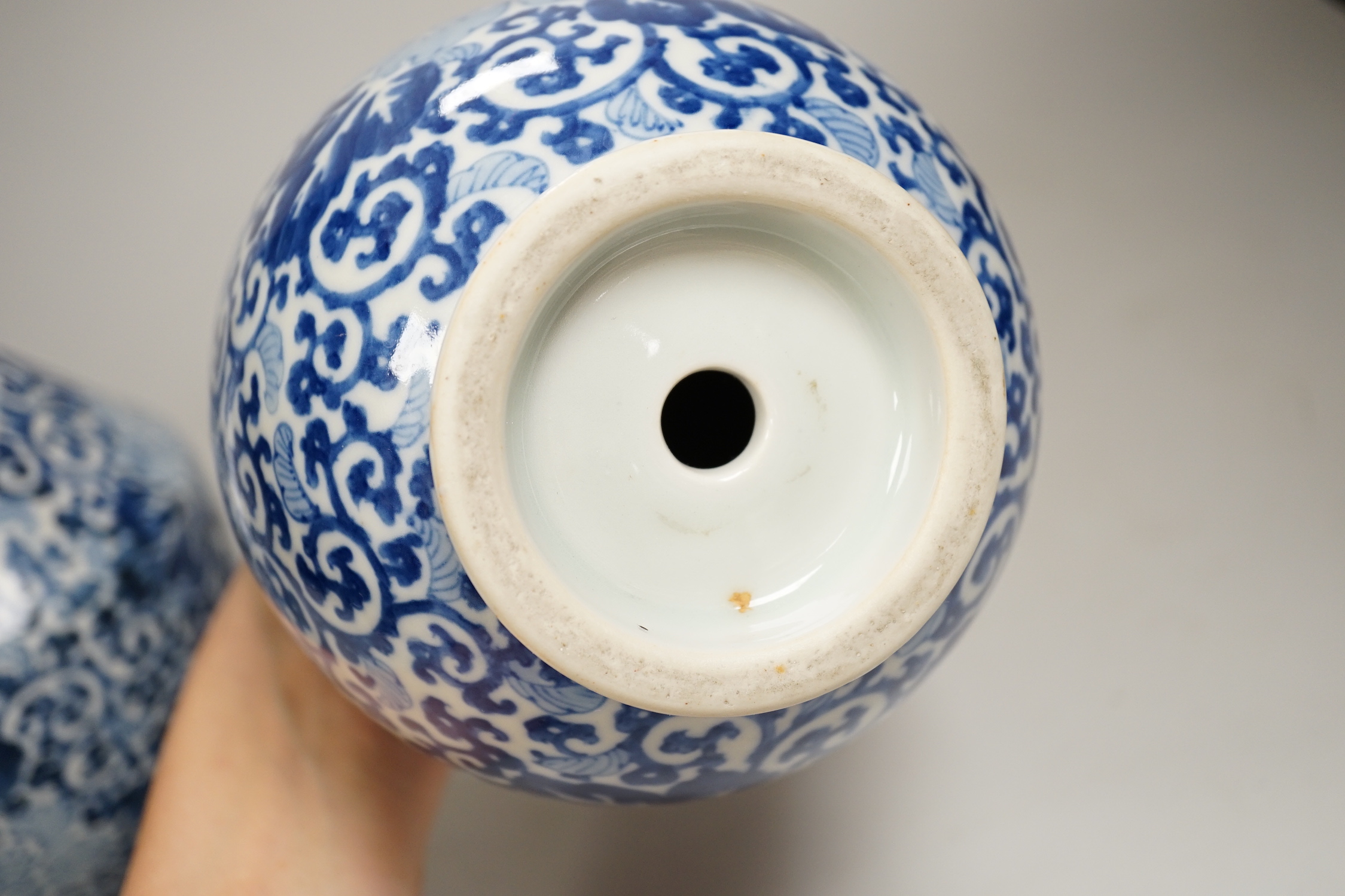 A pair of Chinese blue and white vases, 26cm high